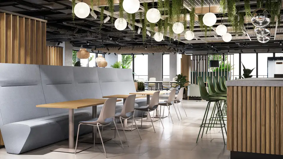 Office caf&eacute; area with booth seating and globe pendant lights