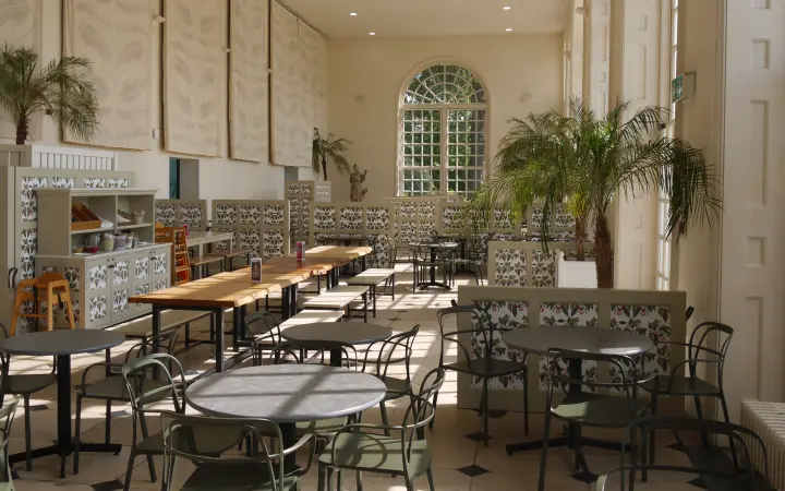 Kew Gardens Orangery restaurant with tables and chairs