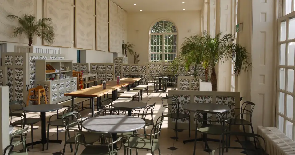 Kew Gardens Orangery restaurant with tables and chairs